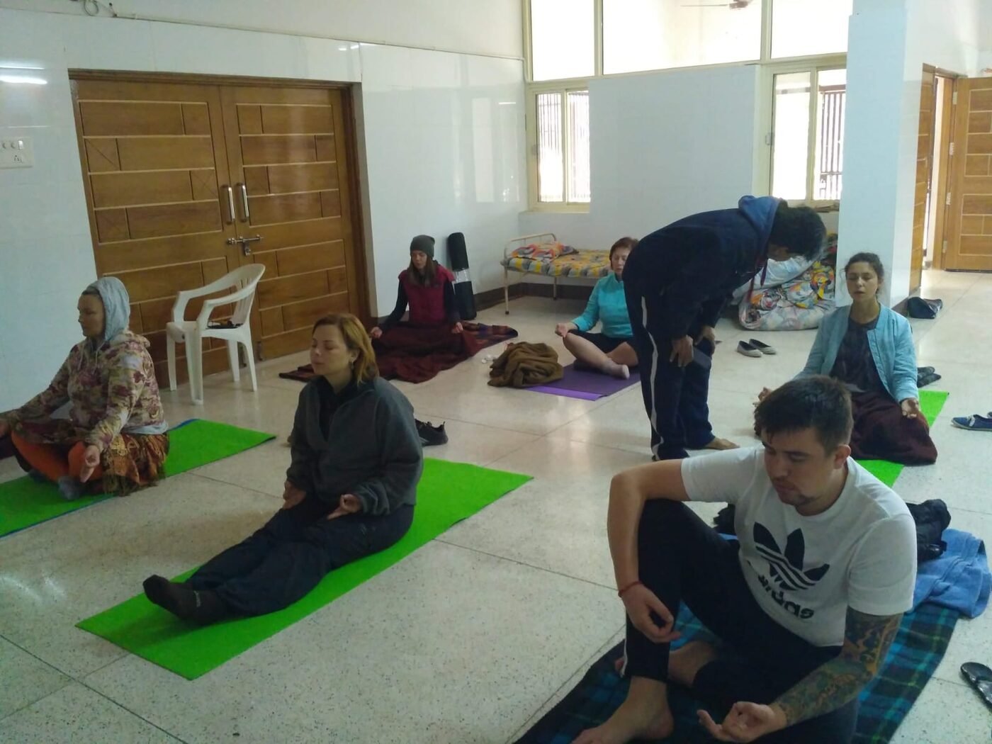 Acharya Rajeev teaching a group